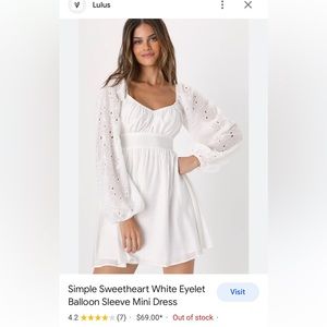 White eyelet balloon sleeve dress by Lulu’s
